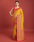 Mustard Banarasi tissue silk saree with zari woven borders