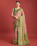 Rose pink Banarasi tissue silk saree with intricate zari work, perfect for festivals.