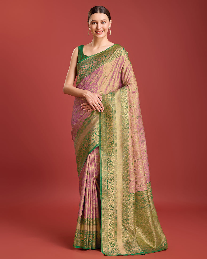 Rose pink Banarasi tissue silk saree with intricate zari work, perfect for festivals.