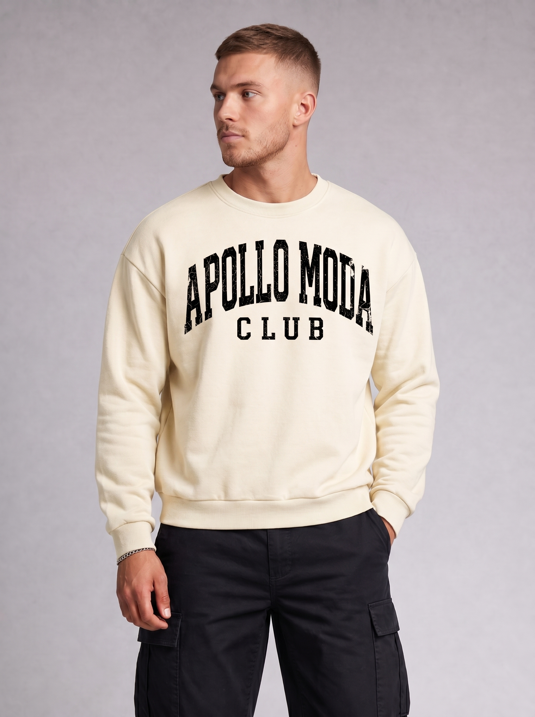 Oversized collegiate crewneck sweatshirt with distressed black arch graphic