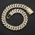 Close up of a 20mm wide diamond-encrusted square zircon Cuban link necklace in gold