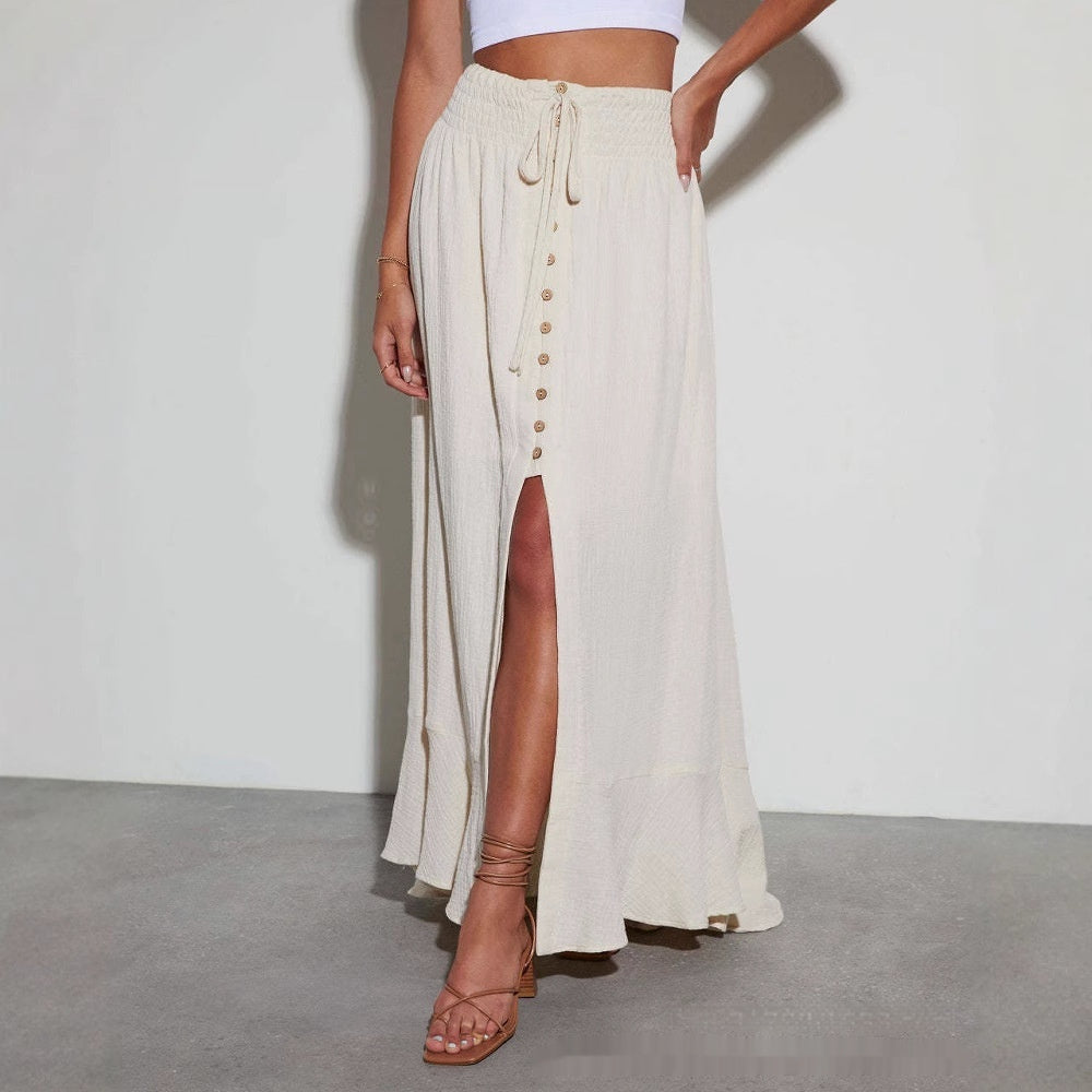 Women's black A-line maxi skirt with lace-up waist detail and asymmetric hem