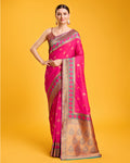Rani pink Banarasi silk saree with rich zari woven borders
