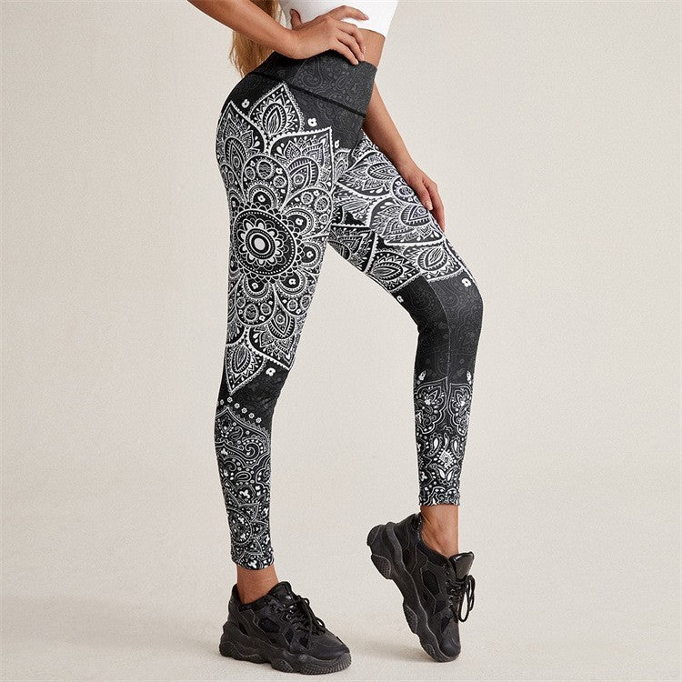 High-waisted compression yoga leggings with side pockets and abstract print