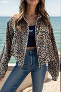 Model wearing a bold leopard print button-down jacket with long sleeves