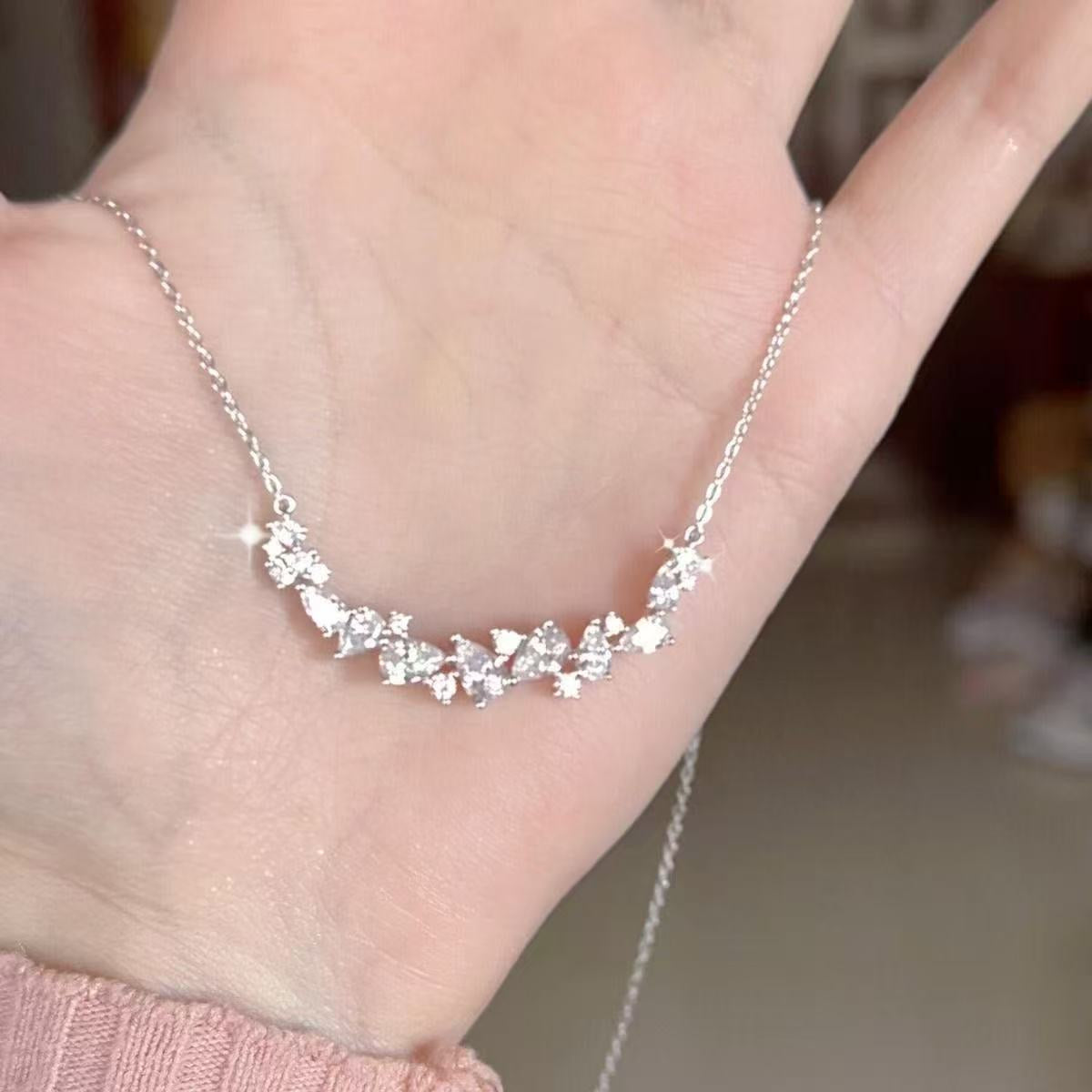 999 Sterling Silver Smile Bar Necklace with CZ Cluster Accent