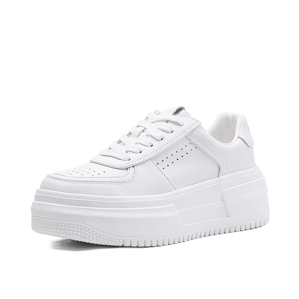 A pair of white platform sneakers with lace-up closure in a clean, minimalist Harajuku style.