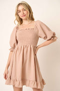 Smocked bodice mini dress with half sleeves and ruffled hem