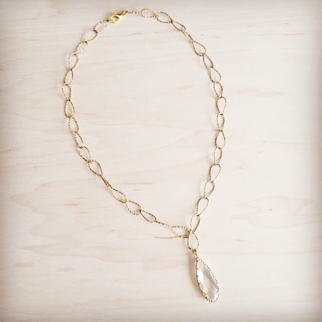 Gold-Tone Teardrop Pendant Necklace with Textured Oval Links - Image 3