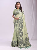 Light green linen cotton saree with a soft textured finish