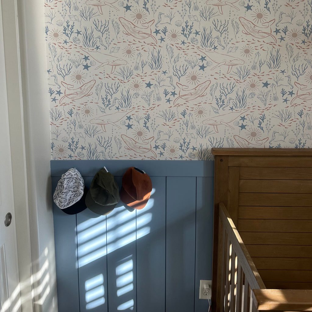 Delmar Wallpaper by Hufton Studio featuring a decorative pattern on an interior wall
