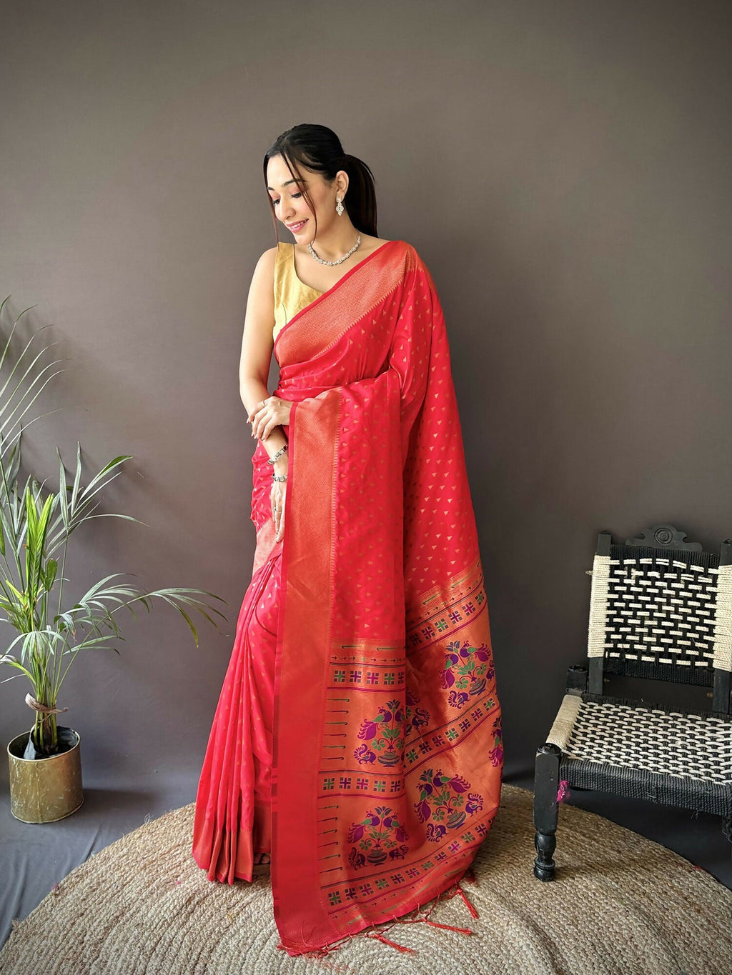 Vibrant red soft Lichi silk Paithani saree with elegant jacquard butti detailing