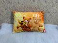 Soft rectangular decorative cushion for kids with a cute teddy bear pattern
