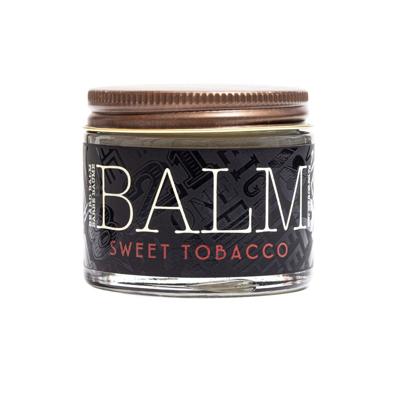 2oz jar of 18.21 Man Made Beard Balm in Sweet Tobacco, featuring a vintage-inspired black and bronze label.