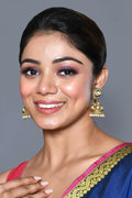 Exquisite Kundan Pearl earrings in Golden, White, and Grey tones.