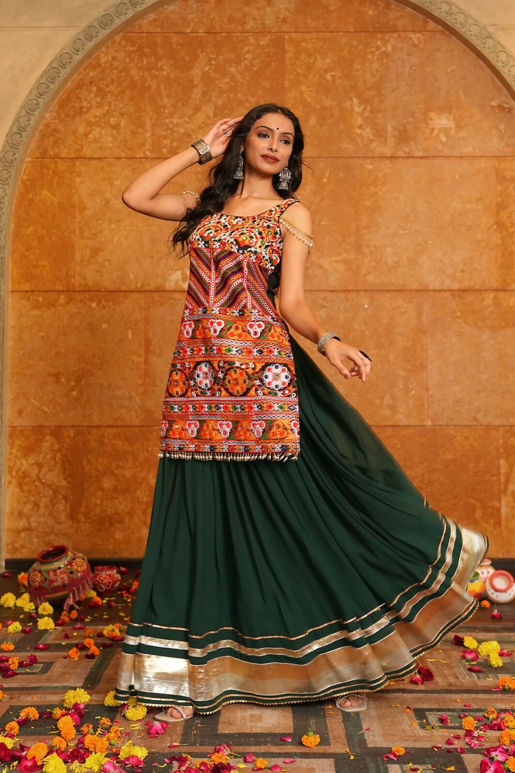 Green georgette lehenga with multi-colored designer blouse