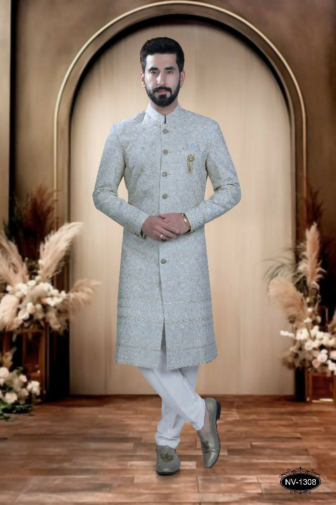 Toddler boy wearing a blue georgette kurta with intricate thread and sequence embroidery