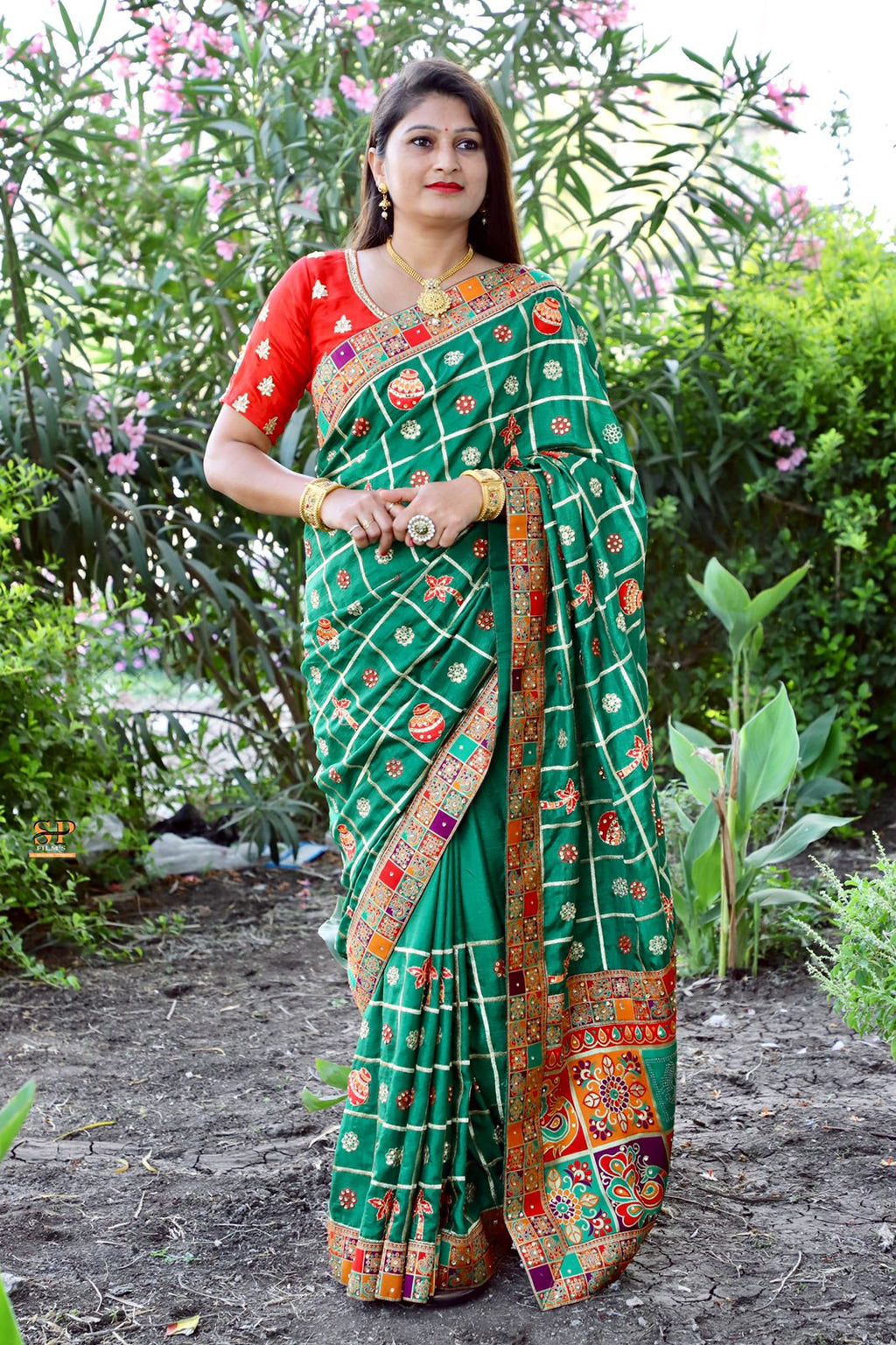 Green Dola silk saree with Jacquard lace border and embroidery