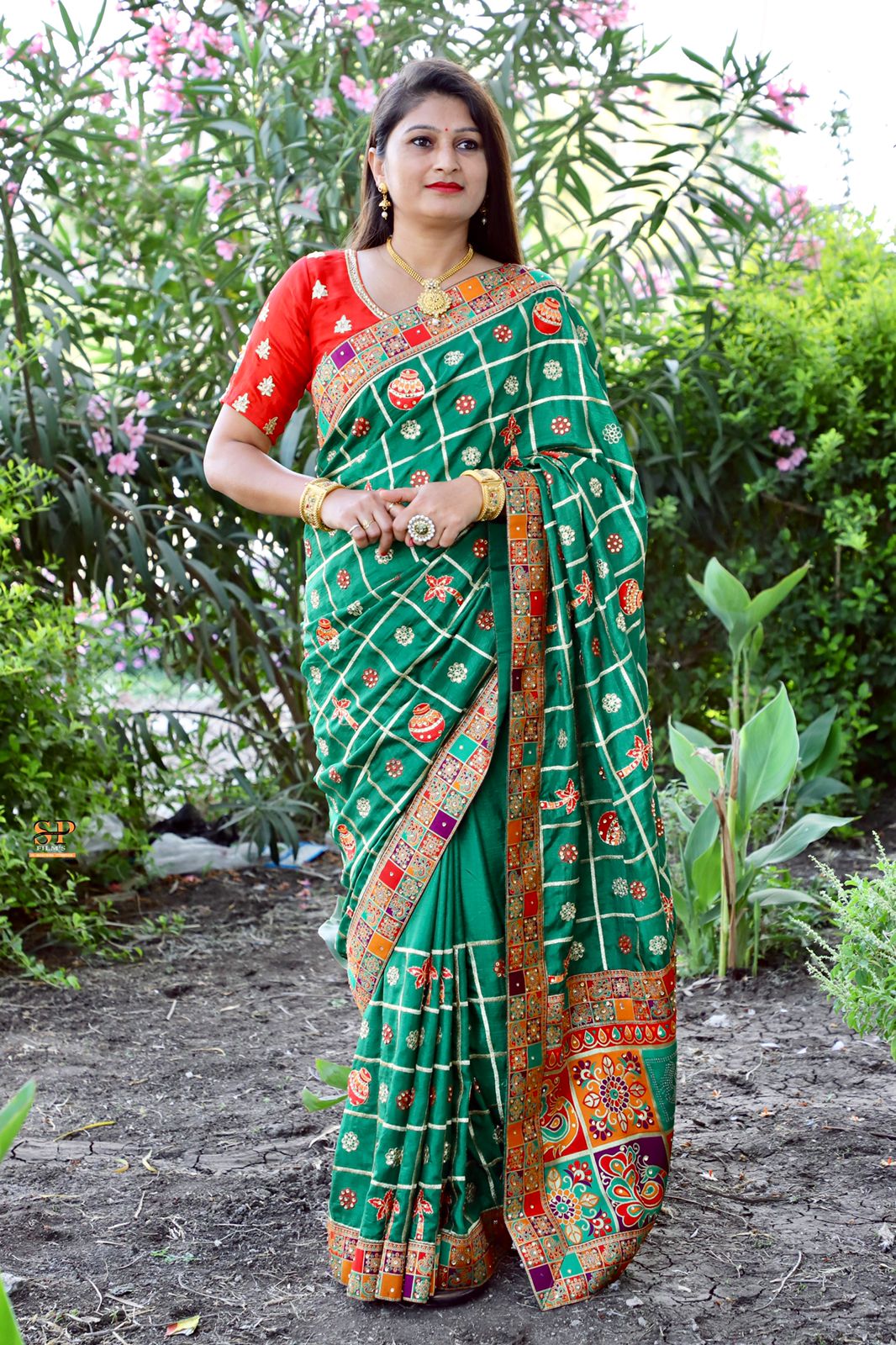 Green Dola silk saree with Jacquard lace border and embroidery