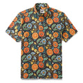 Short sleeve 1950s style floral cotton shirt in orange, yellow, and white.