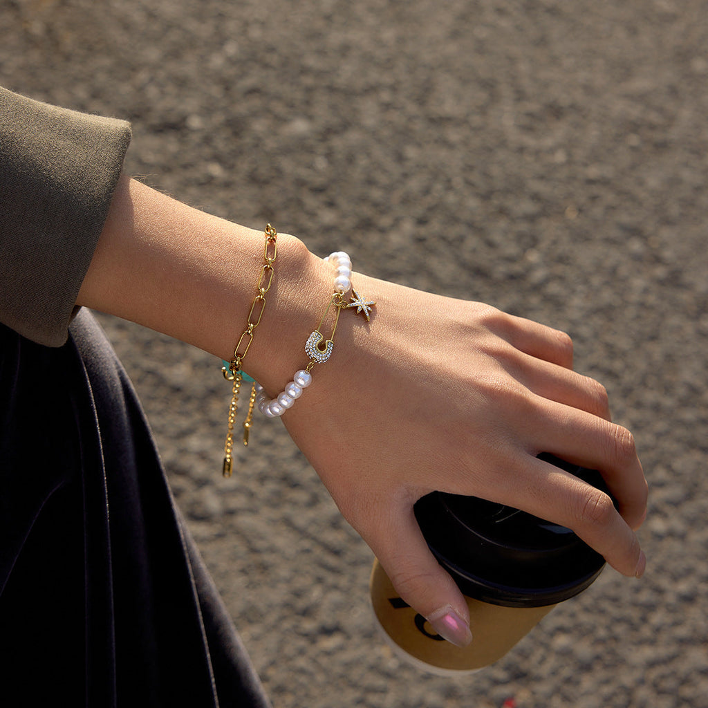 Gold Star and Pearl Charm Bracelet in Stainless Steel with Zircon