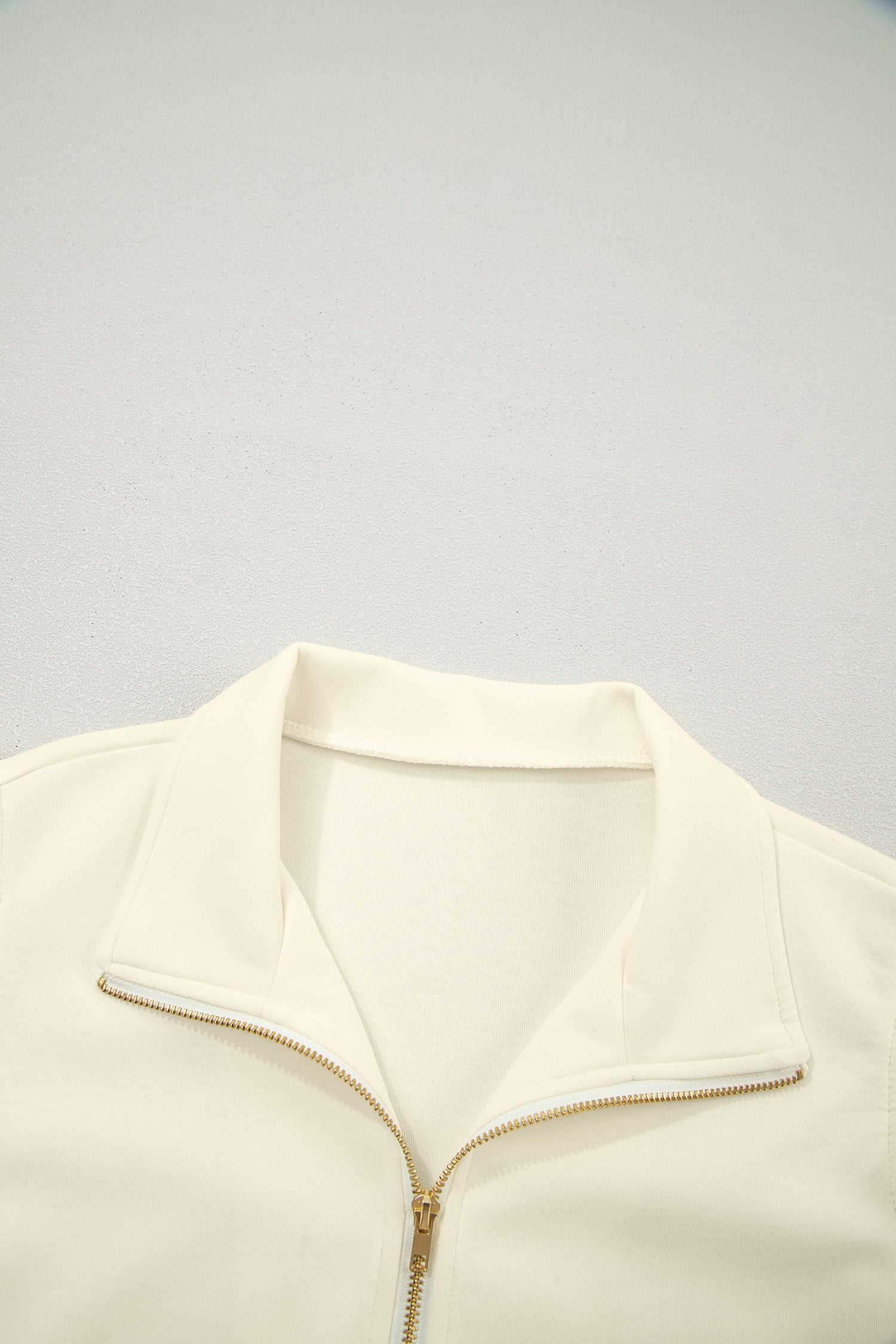 Juniper Ruffled Short Sleeve Blouse in Off-White and Cream