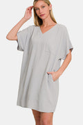 Stevvex women's casual V-neck tee dress featuring functional side pockets in a relaxed fit.
