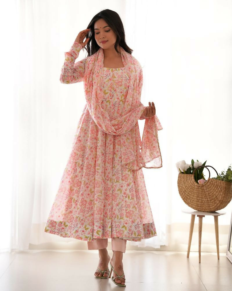 Sophisticated peach organza kurta set with sequin embroidery and matching cotton trousers.
