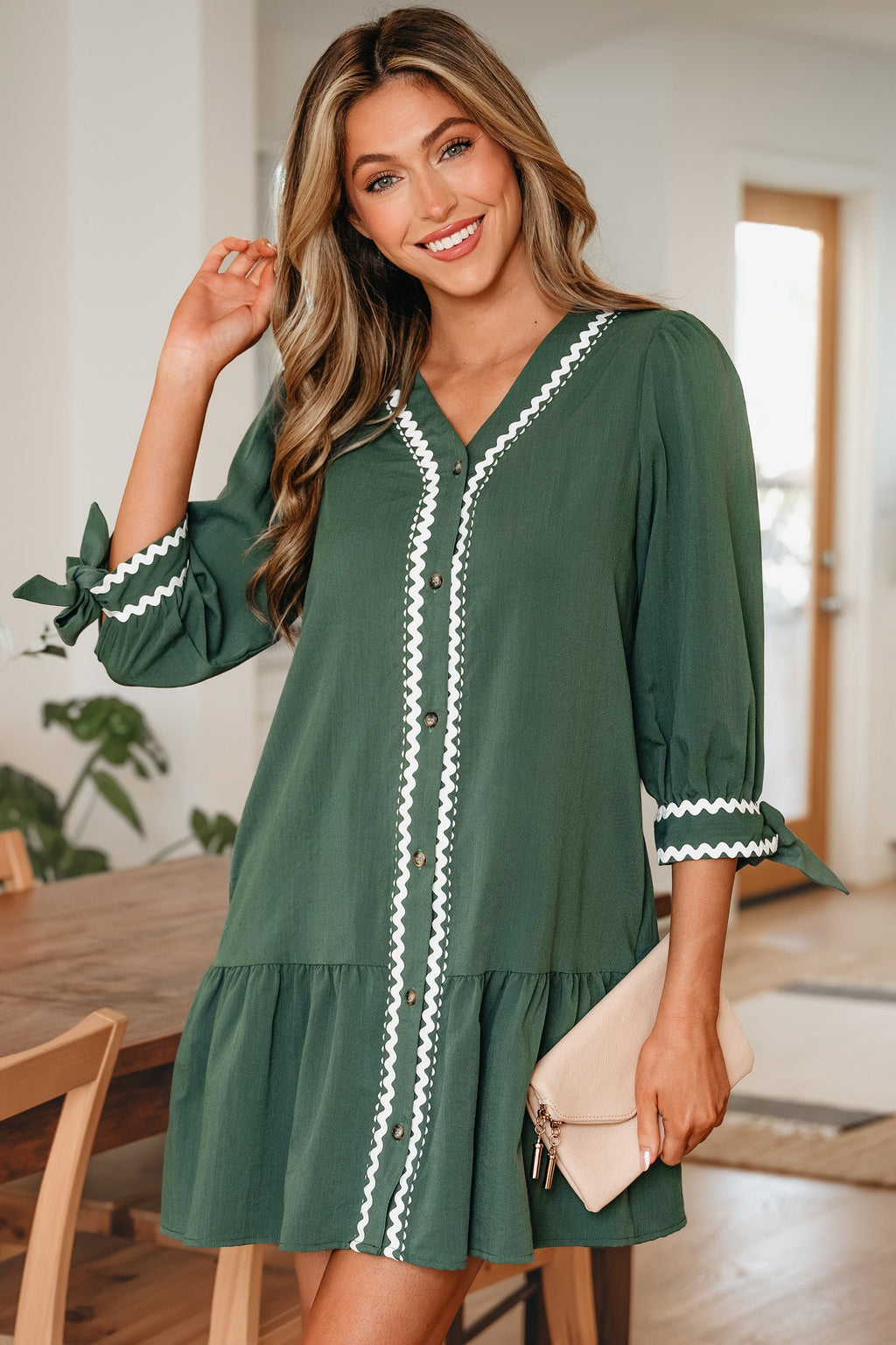 Xyla Bracelet Sleeve Shift Dress in a flowy silhouette with ricrac trim and knotted sleeve detail