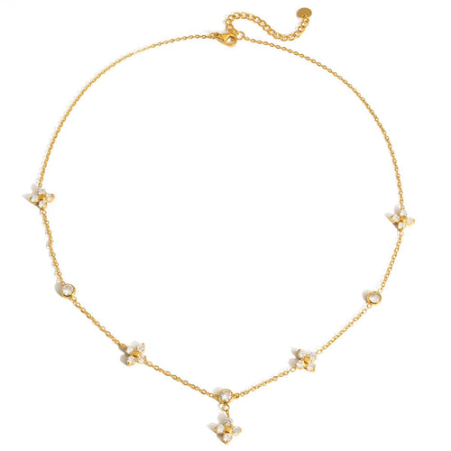 18K gold four-leaf clover pendant necklace featuring sparkling zircons on a delicate chain