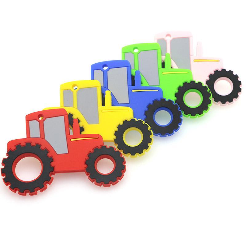 Car and tractor shaped silicone teething toys in red, yellow, blue, green, and black