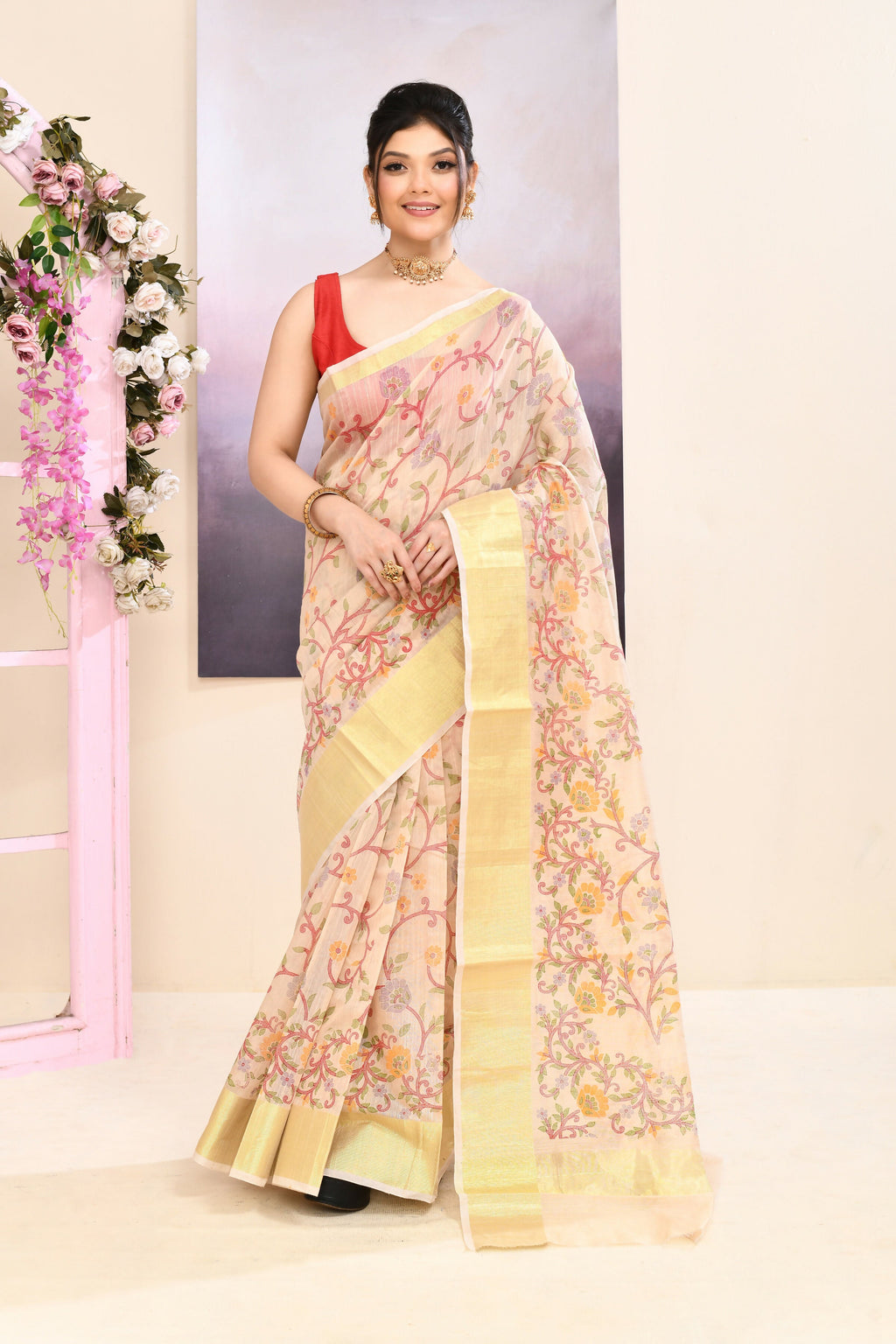 Beige printed cotton blend saree with delicate embellishments