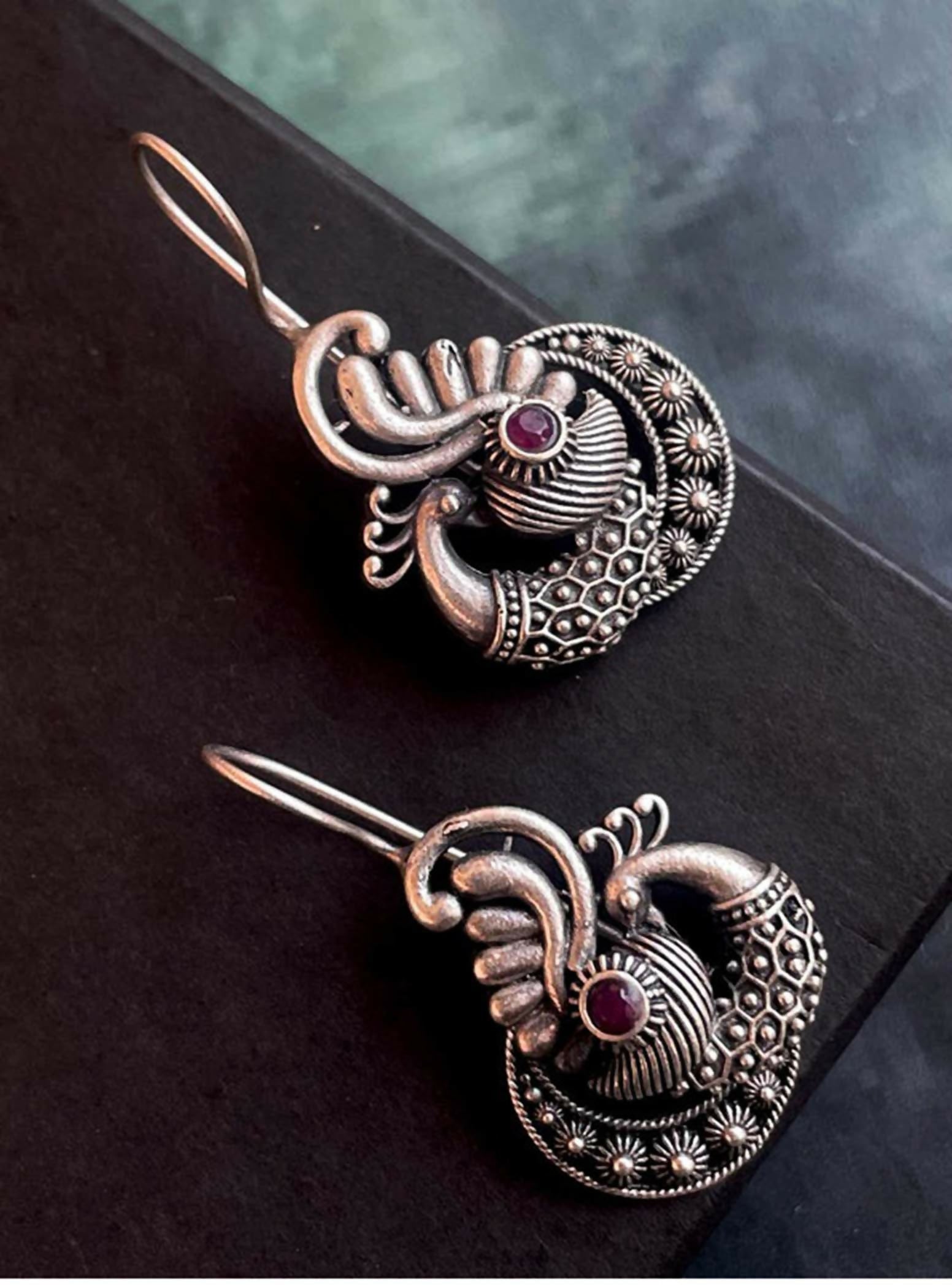 Vintage style oxidized brass peacock shaped stud earrings with black polish