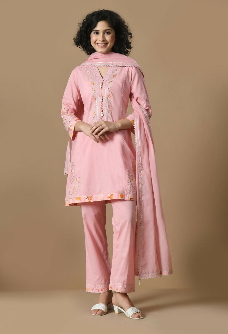 A 3-piece pink cotton kurta set featuring an organza dupatta and cotton bottom.
