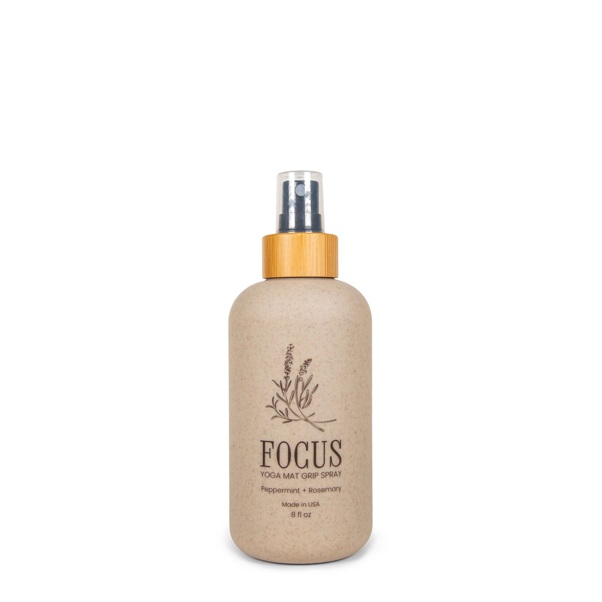8oz beige and brown bottle of Focus Yoga Mat Grip Spray with peppermint and rosemary