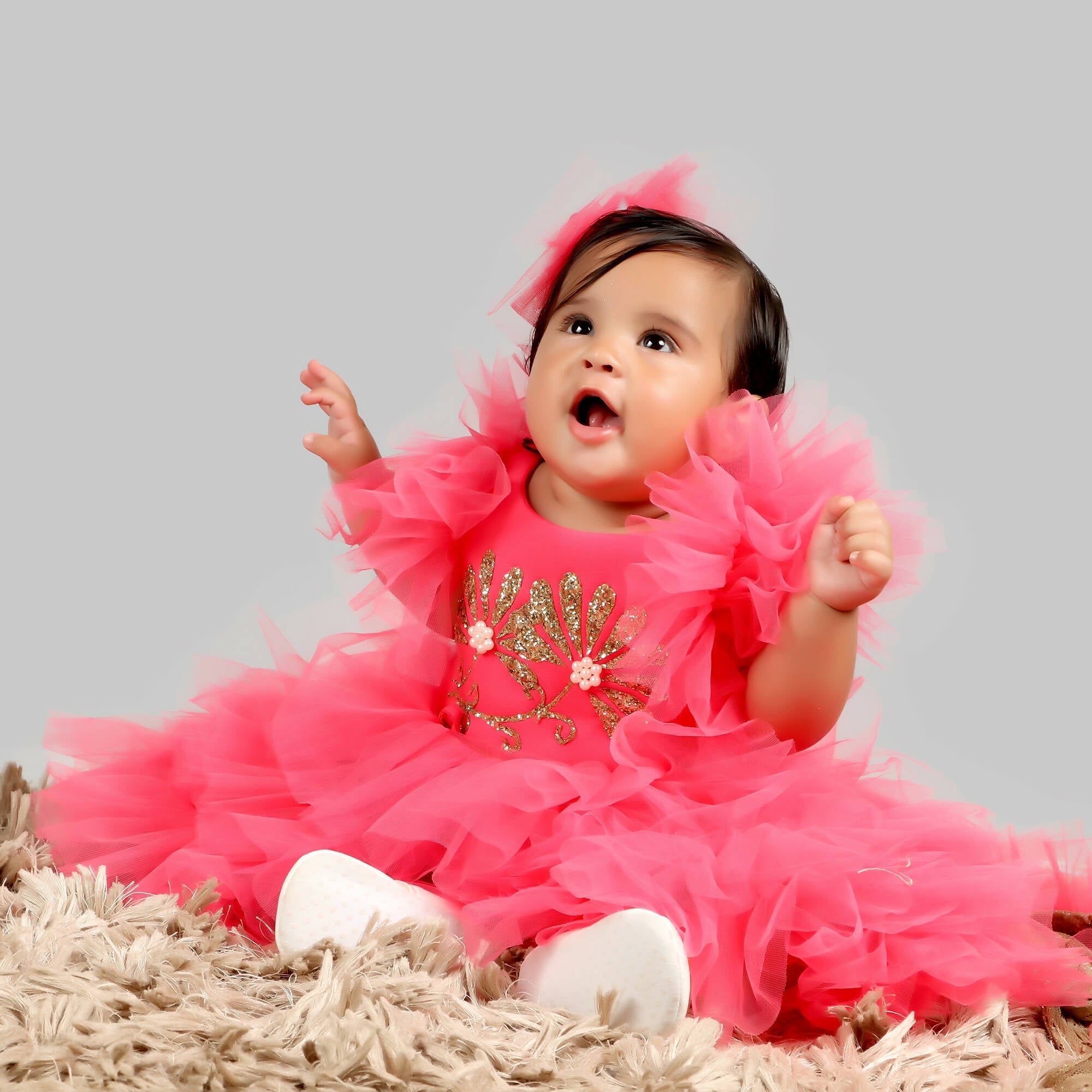 Pink Scuba Bodice Gown with Frill Sleeves and Net Ghera