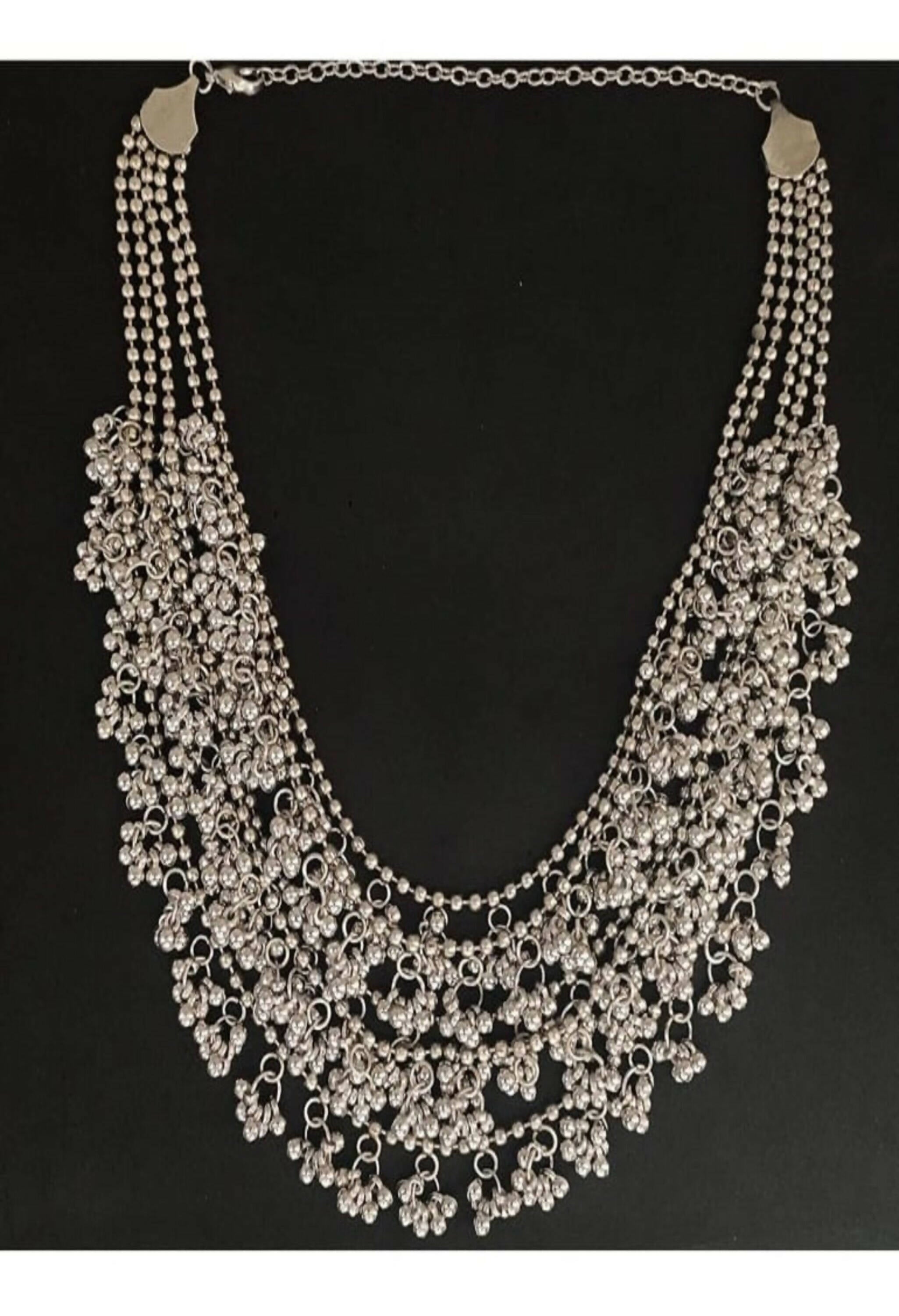 Mominos Fashion silver-plated brass oxidised ghungroo long necklace set with matching earrings