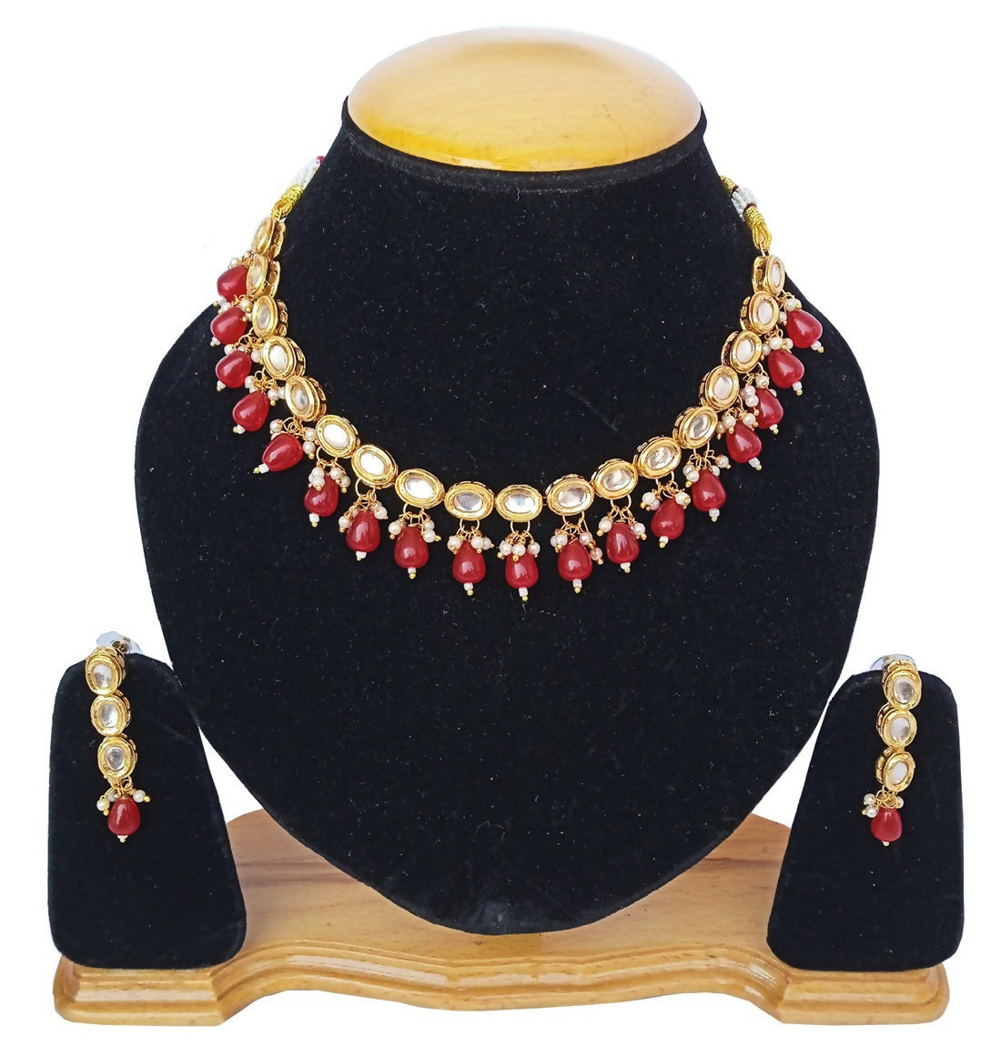 Stunning red Kundan stone necklace set with gold plating for traditional wedding wear