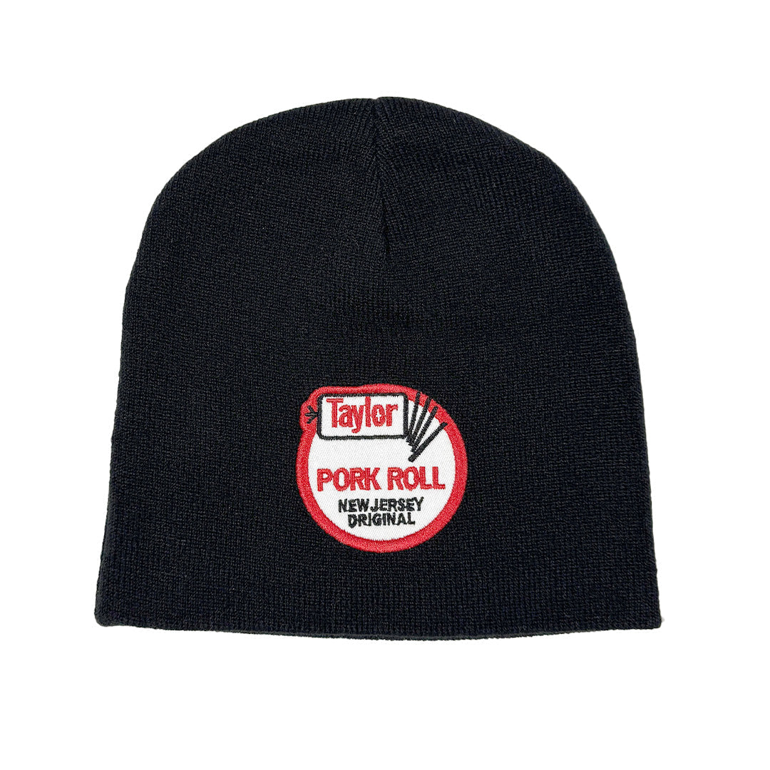Black knit beanie with high-contrast red and white Taylor Pork Roll embroidered patch