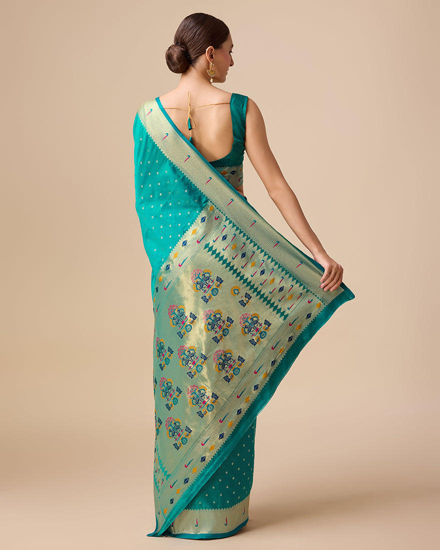 Regal Turquoise Paithani Silk Saree with Delicate Gold Zari Work