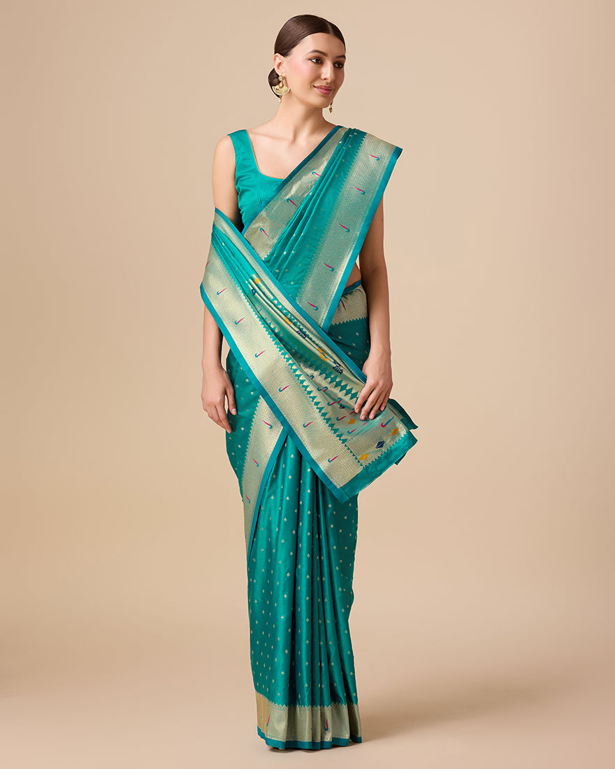 Regal Turquoise Paithani Silk Saree with Delicate Gold Zari Work