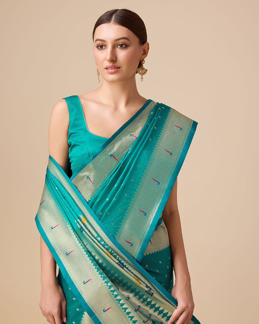 Regal Turquoise Paithani Silk Saree with Delicate Gold Zari Work
