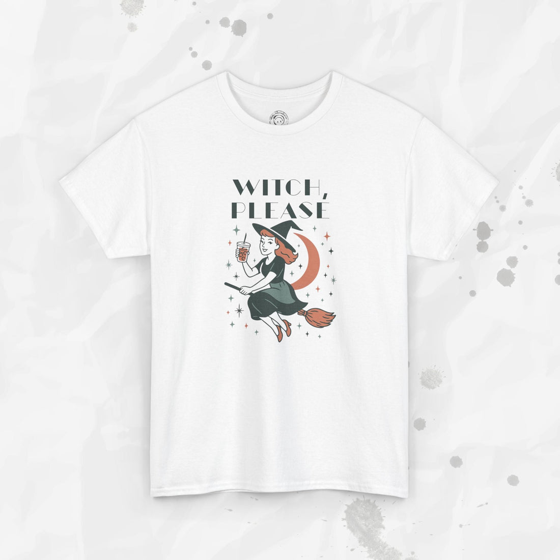 A white crewneck t-shirt featuring a retro graphic of a witch on a broomstick holding an iced coffee with the text Witch Please.