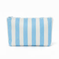 Spacious blue striped terry cloth cosmetic pouch for travel and skincare storage