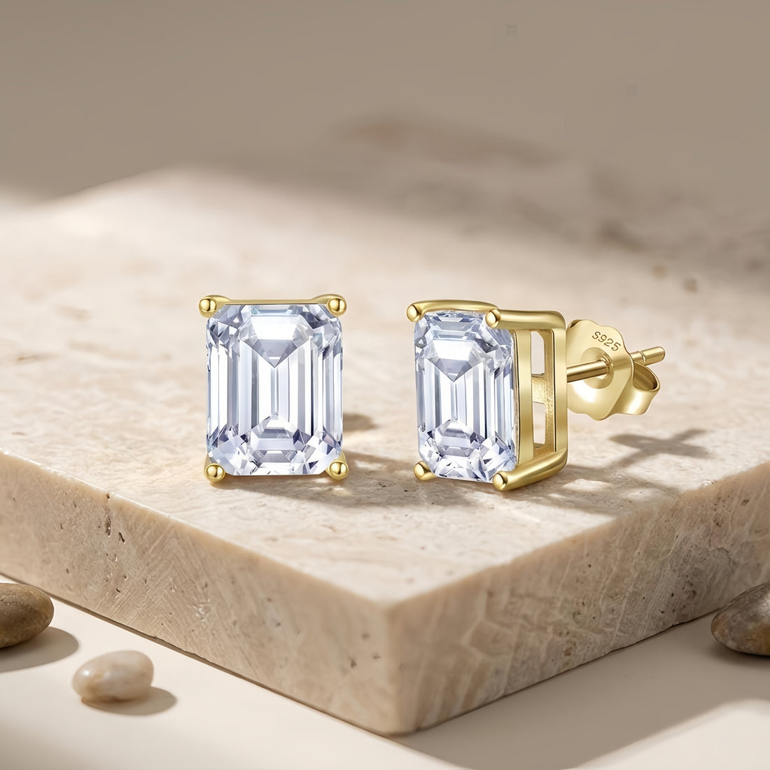Emerald cut cubic zirconia stud earrings in gold-plated 925 sterling silver