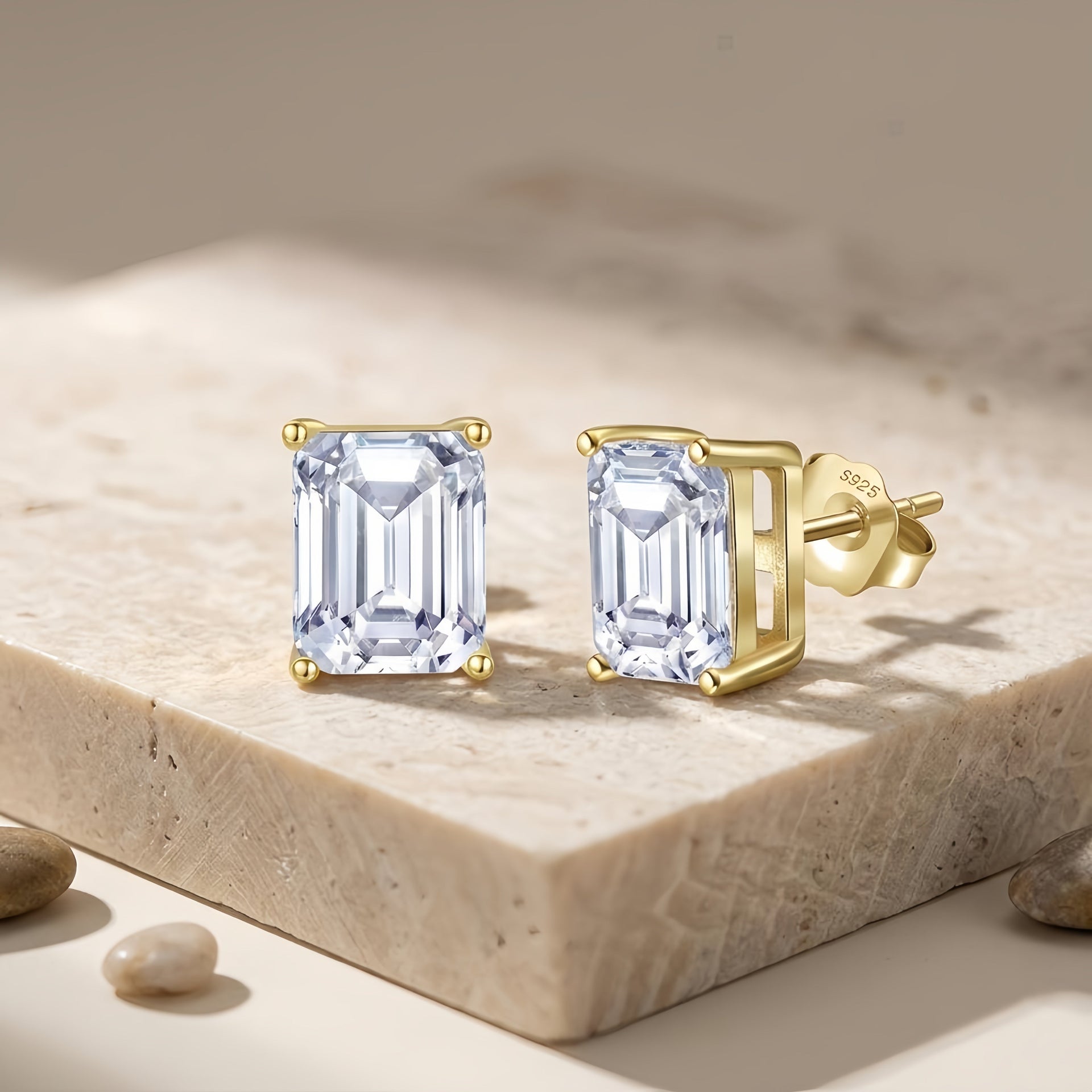 Emerald cut cubic zirconia stud earrings in gold-plated 925 sterling silver