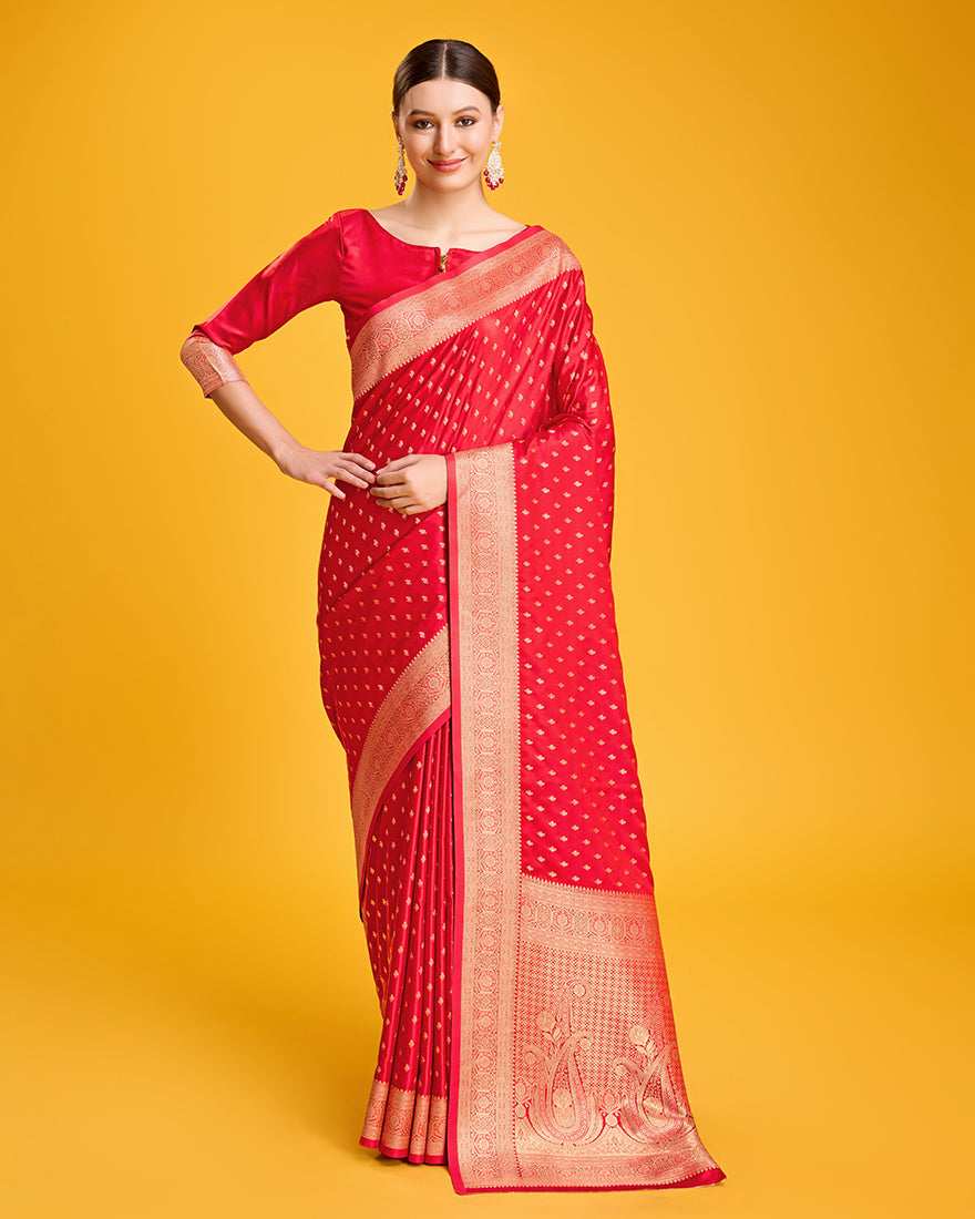 Deep red Banarasi satin silk saree with heavy zari brocade embellishments.