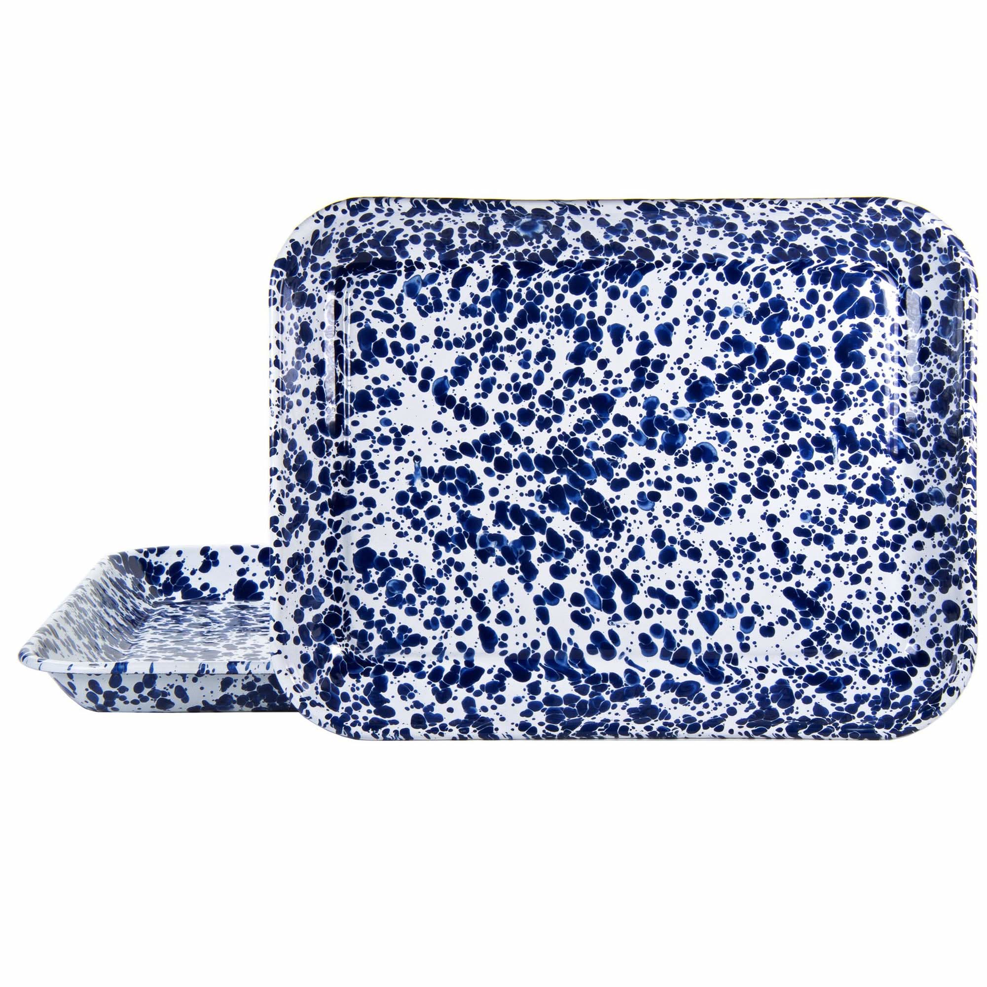 Set of two rustic spatterware enamelware quarter sheet trays with stainless steel rims.