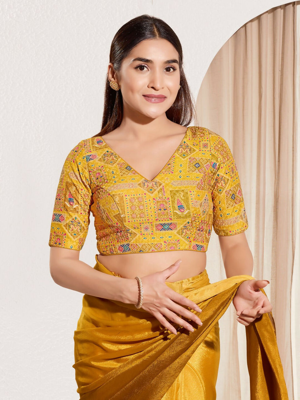 Yellow viscose rayon blouse with V-neck and elbow length sleeves