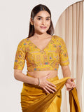 Yellow viscose rayon blouse with V-neck and elbow length sleeves